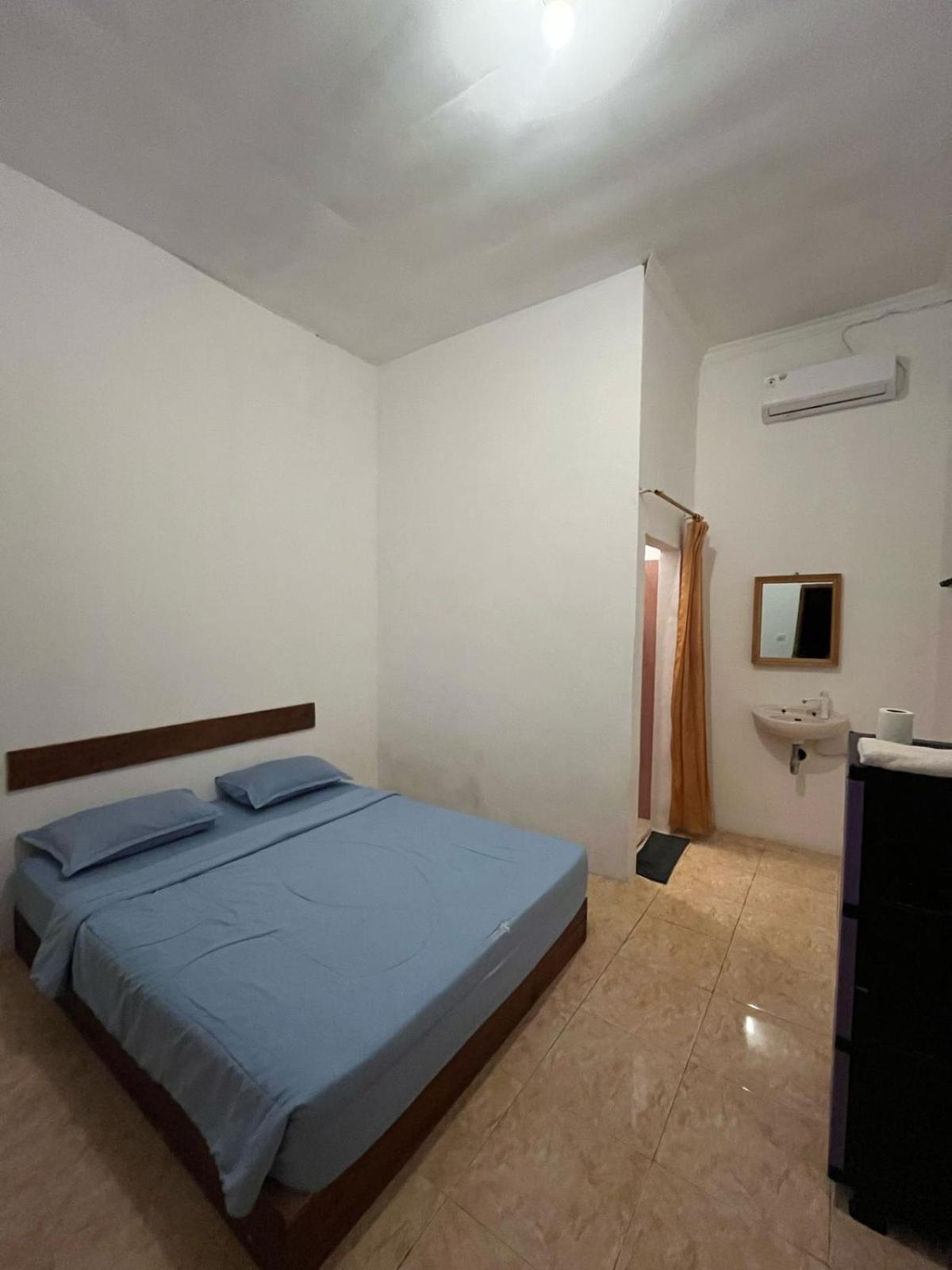 Roby Homestay Kuta  Habitación foto
